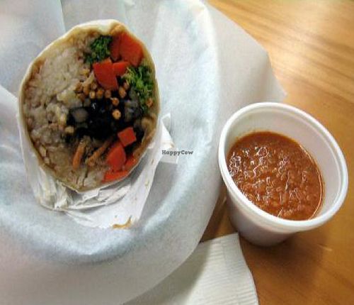 Chow Mommy wrap - tofu, white rice, black beans, steamed veggies, teriyaki sauce with crispy noodles in a flour wrap.  Habenero hot sauce on the side. at Wrap Planet in Winter Park