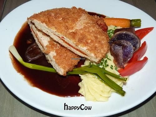 Cordon bleu, with potatoes puree and grilled chalottes. at Kopps in Berlin