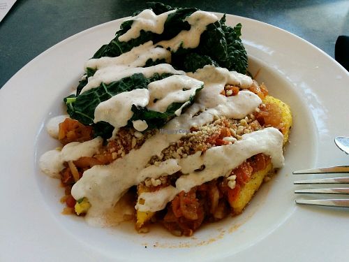 Warm-hearted Pan Seared Polenta with extra sauteed kale - delish at cafegSC in Santa Cruz