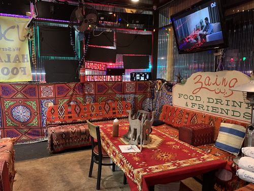 Inside seating with outdoor access  at Zaina. مطعم in Seattle