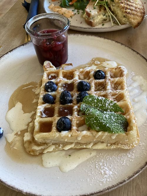 Waffle with hot cherry topping   at Easy Peasy in Berlin