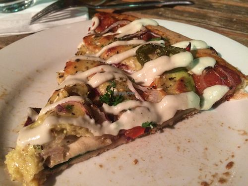 Don't miss 'Cheeky Tuesday' for all you can eat vegan pizza.  Variety of flavors, including dessert ones! at Mandala & Co in Mermaid Beach