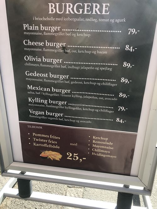 Advertisement sign outside: The advertise with their new vegan burger.  at Café Olivia in Vanloese