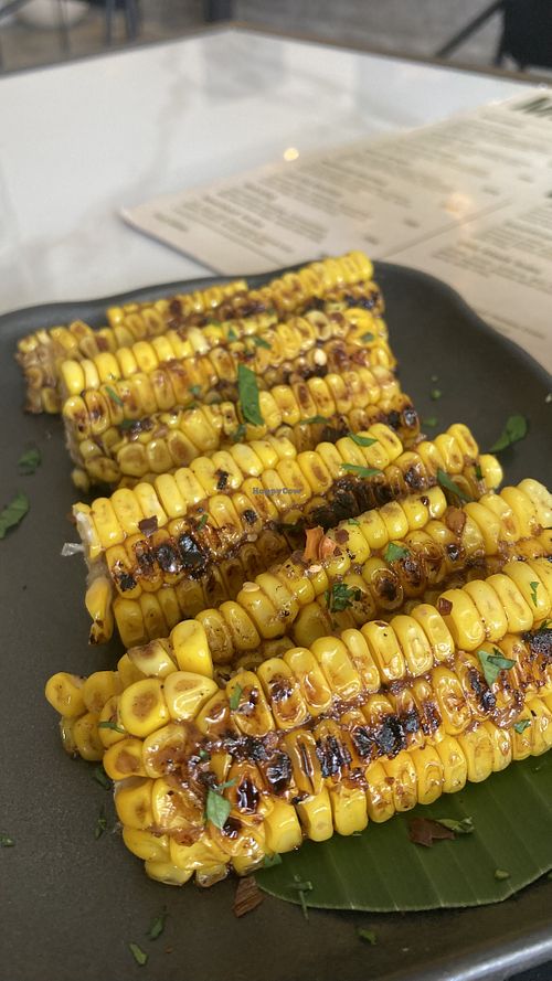 Complimentary marinated sweet corn!  at Sauce Tree Kuta in Kuta