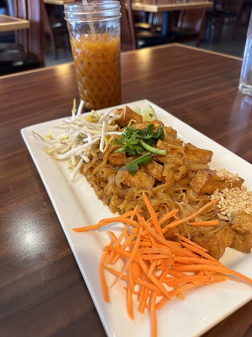 Vegan pad Thai with a vegan Thai iced teaa  at Bann Thai in Fort Collins