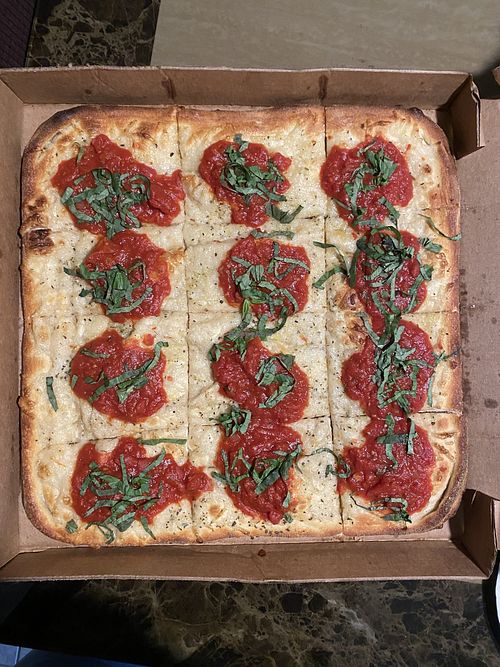 Grandma pizza with vegan cheese   at Antonio's House of Pizza in Kissimmee