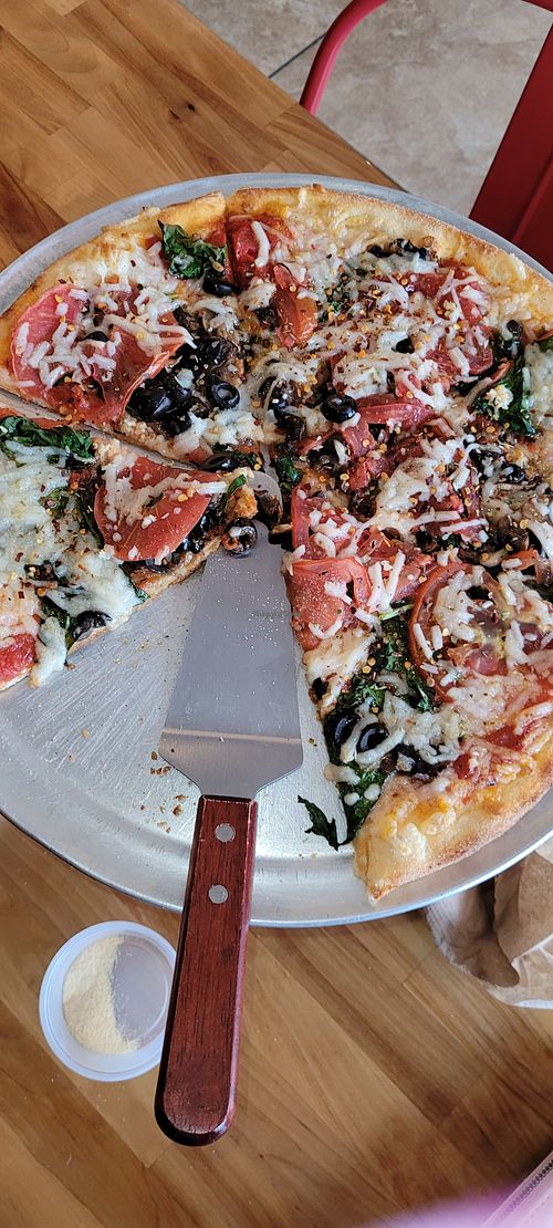 They don't have any mock meats, but portobello mushrooms and large tomatoes give the illusion at Antonio's House of Pizza in Kissimmee