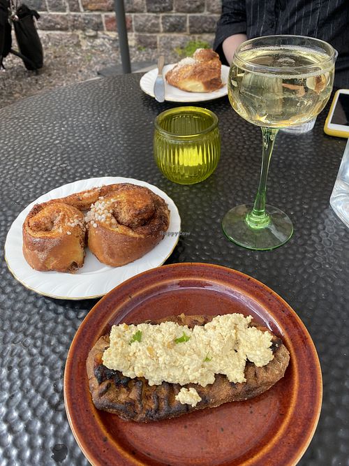 Cinnamon buns, carelian pies and cava. 💚  at Kahvila Rakastan in Helsinki