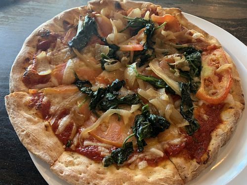 Personal pizza, vegan cheese, roasted onions/tomatoes/spinach  at Coal Fire  in Gaithersburg