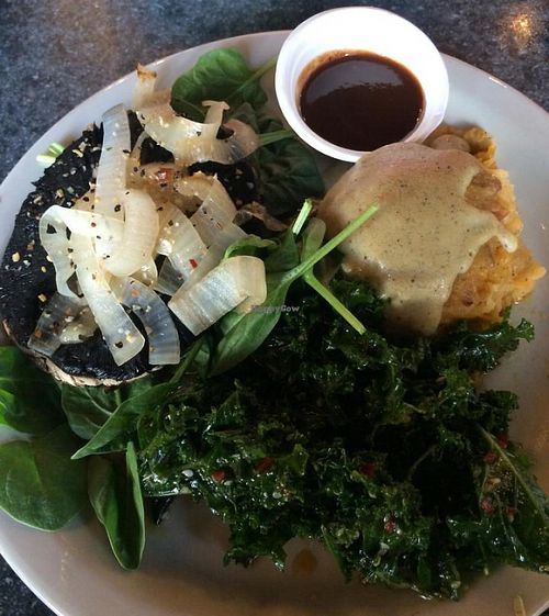 Portobella mushroom steak with mashed potatoes, gravy, and sauteed kale at Green Vegetarian Cuisine at Alon in San Antonio
