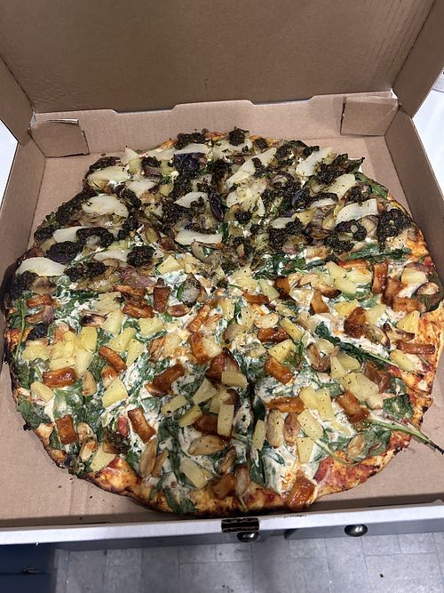 Pesto, pear, potato and half spicy tofu  at Willamette Artisan Pizza in Eugene