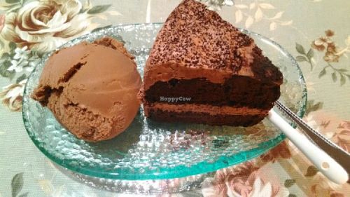 Vegan chocolate cake with vegan ice cream at May Veggie Home in Bangkok