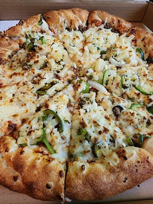 Ali Baba Vegan Pizza with Beyond Meat and Daiya Cheese (thick crust) at Ali Baba Pizza in Langford