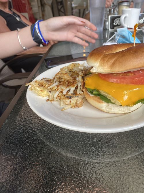 Bagel 🥯 faux egg sandwich with hash browns  at The Green Table in Palm Harbor