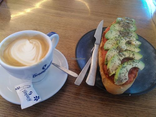 Tomato avocado toast and soy milk cafe con leche at Mambara in Santiago De Compostela