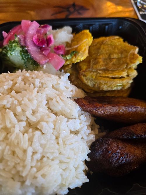 Vehitarian plate with Cuan black beans on the side at Azucar in Rota