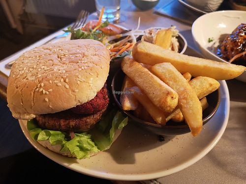 BIH Ultimate Vegan Burger with MM patty plus a great home made harissa falafel on top. at The Bird In Hand in Wreningham