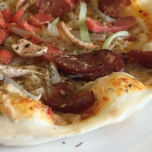 yummy sausage and onion thin-crust pizza! at Jing Fun Vegetarian in Beijing