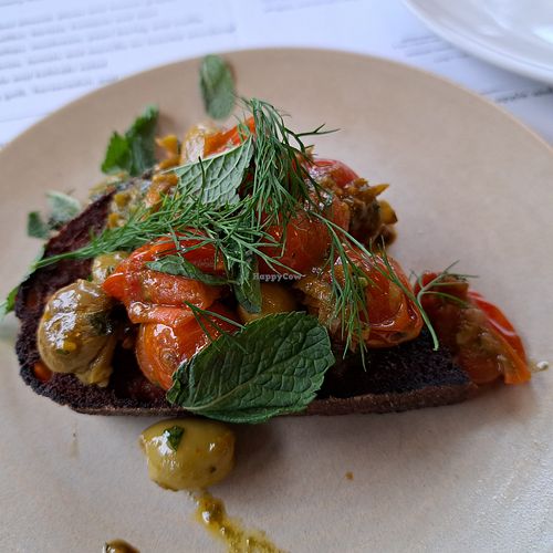 Tomato and olives on sourdough toast at Ox and Finch in Glasgow