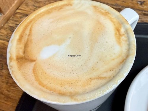 Pistachio latte (a fall special) made w/soy milk  at Caffè Nero in Somerville