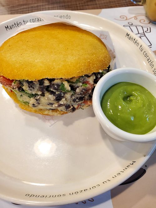 Biscuit sandwich stuffed with a hummus mixture at Biscuits by Nane in Guayaquil