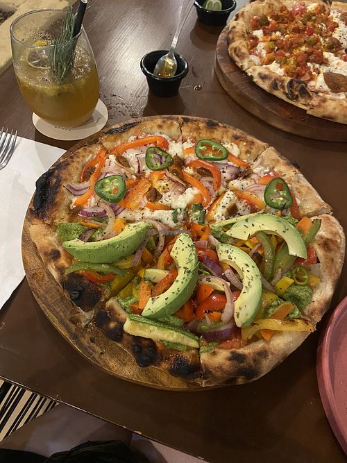 Half green reef, half la mexa   at Coral Vegan Pizza in Playa Del Carmen