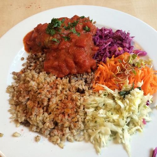 Chops made with Chickpea, with Indian tomato sauce, whole grain rice, buckwheat and 3 salads. Yum yum!! at Green Way - Food For Life in Sopot