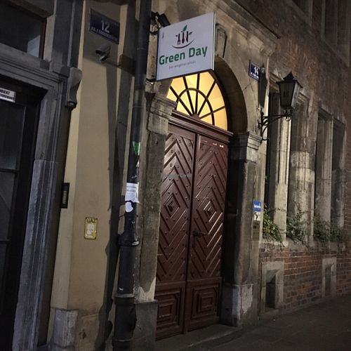 outside at night  at Green Day in Krakow