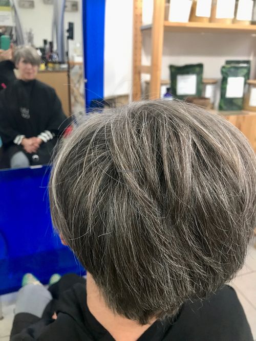 She removed the leftover brown so the gray could show thru!  at Bio Vegan Hair Salon in Siracusa