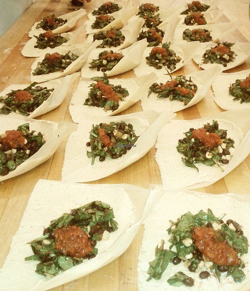 Production photo of Boulder Tamales Handmade Vegan Tamales. Spinach, Black Beans, Corn and Tomato Salsa.  Touch of spicy.  Organic, including extra virgin olive oil.  at Boulder Tamales in Boulder