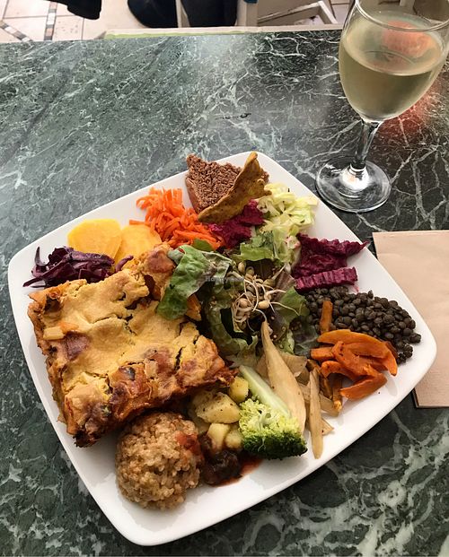 Vegan lasagna and white wine at Cafe Ginger in Paris