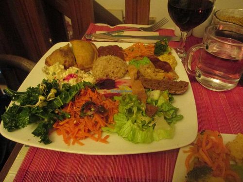 Dinner meal of 2 empanadas and salads. at Cafe Ginger in Paris