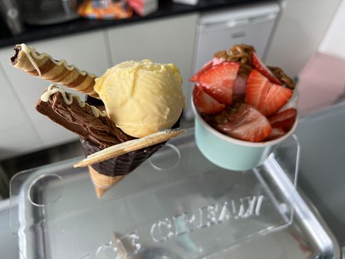 Ice cream cone and tub  at Reddy's Marvellous Dessert Parlour in Aberdeen