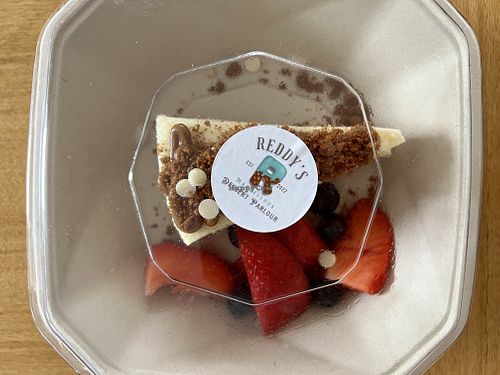 Takeaway vegan cheesecake box  at Reddy's Marvellous Dessert Parlour in Aberdeen