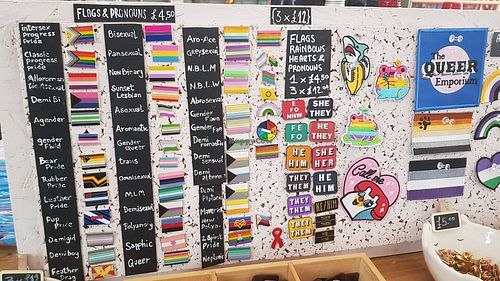 Flags and pronouns at The Queer Emporium in Cardiff