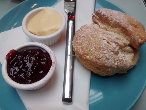 Scone, spread, and jam at Saramago Cafe Bar in Glasgow
