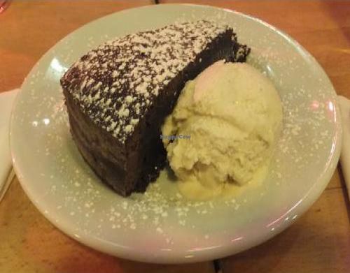 Chocolate torte, vegan and delicious.  Smelt it baking while we were eating our main... worth the wait! at Saramago Cafe Bar in Glasgow