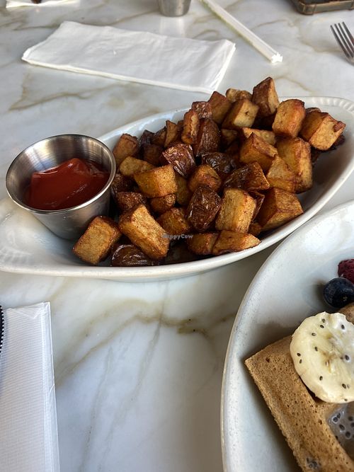 Breakfast Potatoes - Side (HUGE Portion) 😅  at The Den Cafe in Santa Ana