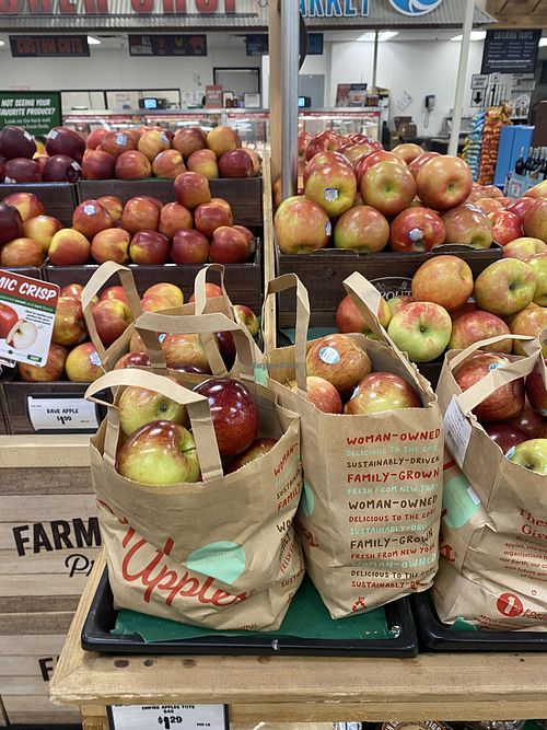 Women Owned Bag Totes of Apples  at Sprouts Farmers Market in Modesto