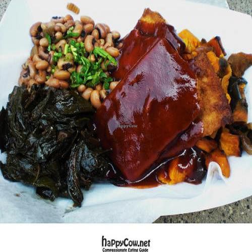 Texas-Style BBQ Tofu with black eyed peas, collard greens, sweet potatoes, peppers, and onions. at Dandelion Food Cart in Madison