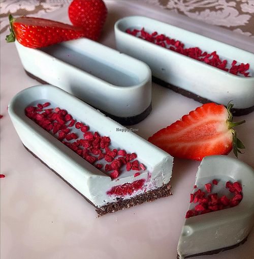 Vanilla dessert with blue spirulina and raspberries at SweetLi by Lilit in Yerevan