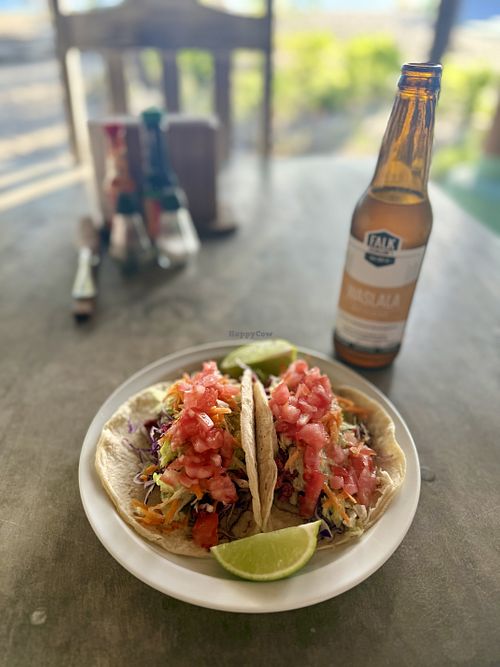 RAW VEGAN TACOS


Delicious sundried tomato/walnut filling, topped with

tomatoes, lettuce, carrots, and lime cashew crema

served on corn tortillas or cabbage leaves.  at The Happy Coconut in Tola