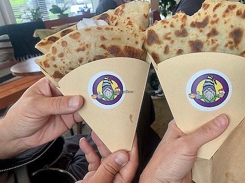 Street crepes with the rainbow gnome logo at Cup & Crêpe in Everett