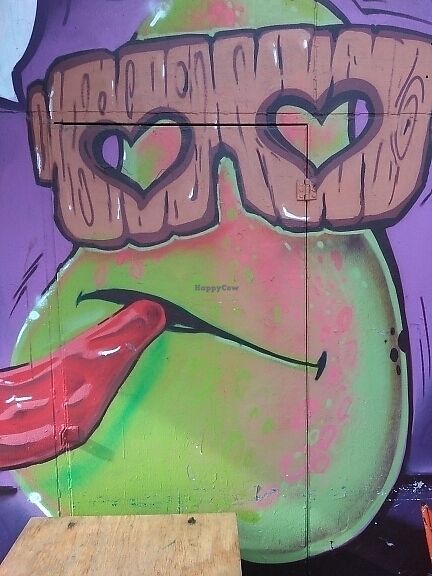 Artwork outside cafe at EmmaPea Vegan Food and Bar in Berlin