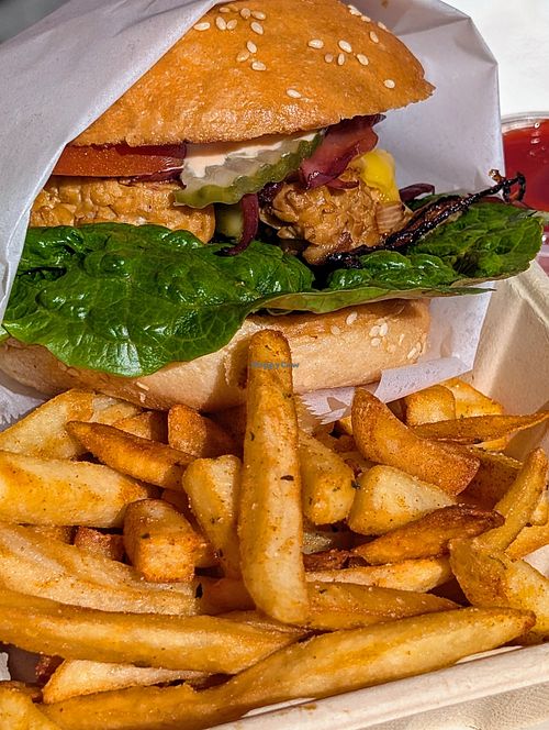 The burger (tempeh) with fries at Maciel's Plant-Based Butcher & Deli in Los Angeles