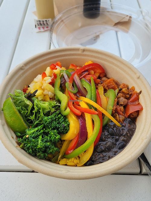 Build your own bowl with sweet potato picadillo, black beans, yellow rice, and vegetables at Cocina Cubana in Santa Rosa Beach