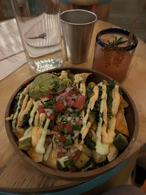 Vegan nachos and blood orange mezcalita  at De Buena Planta in Los Angeles