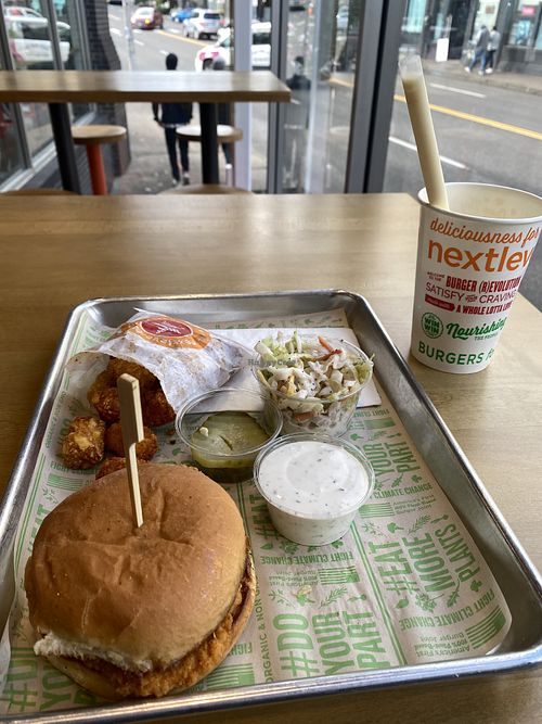 Vegan Buffalo Chick’n, Tots, Orange Cream Shake 😛  at Next Level Burger - West Burnside in Portland