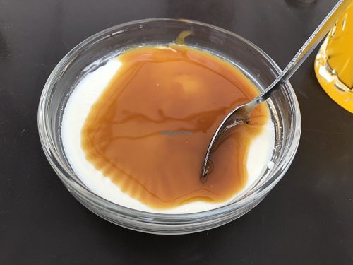 Vegan panna cotta with caramel sauce  at FOMU Café in Antwerpen