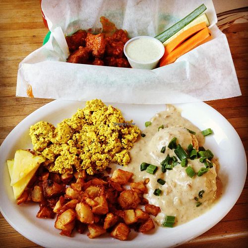 Biscuits & Gravy, tofu scramble, hash potatoes, w/ a side of buffalo wings (at the top) at nami Vegan Sweets in Phoenix